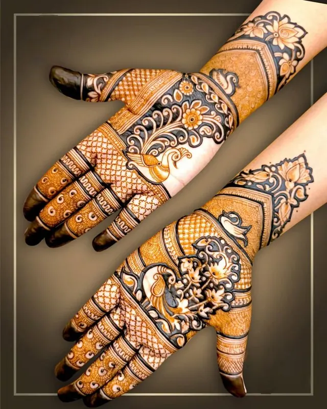 Elegant Arabic and floral mehendi design on hands by Anand Mehendi & Tattoo, Bhubaneswar