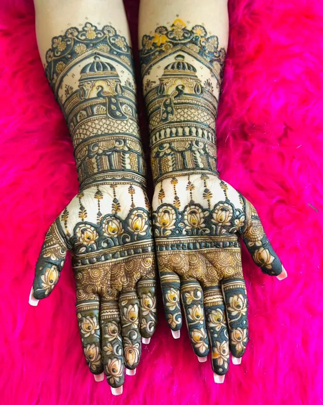 Traditional full-arm mehendi design by Anand Mehendi & Tattoo, Bhubaneswar