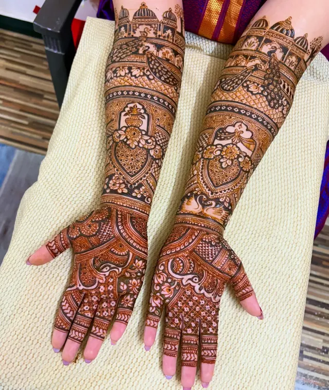 Traditional full-arm mehendi design by Anand Mehendi & Tattoo, Bhubaneswar