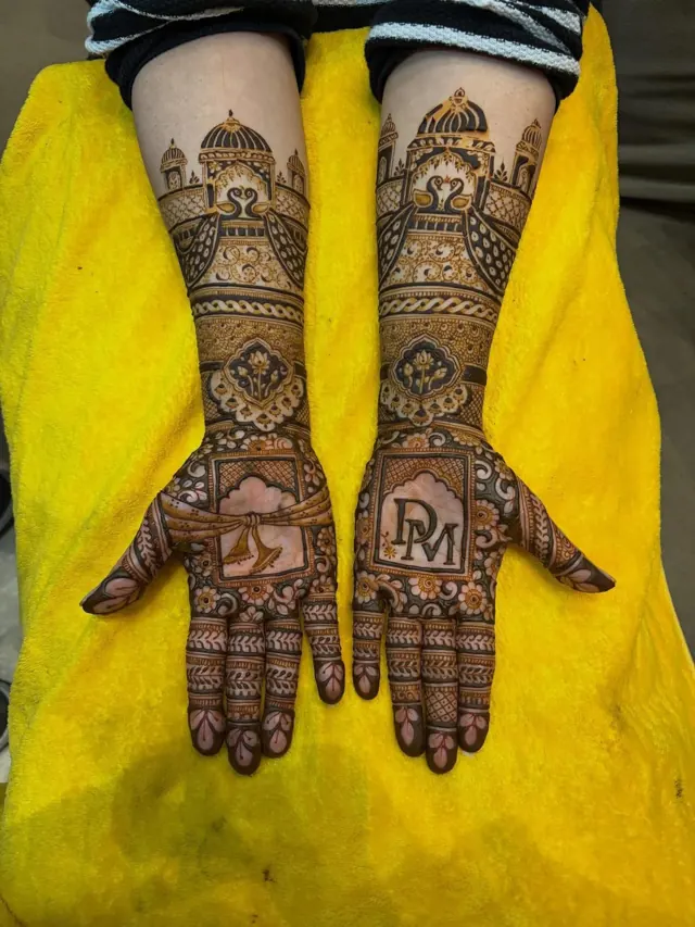 Traditional full-arm mehendi design by Anand Mehendi & Tattoo, Bhubaneswar