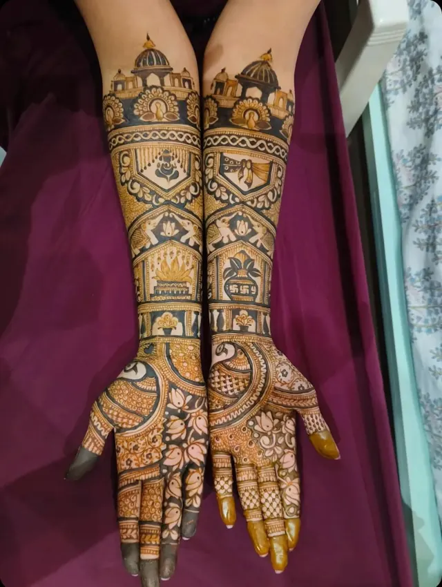 Traditional full-arm mehendi design by Anand Mehendi & Tattoo, Bhubaneswar