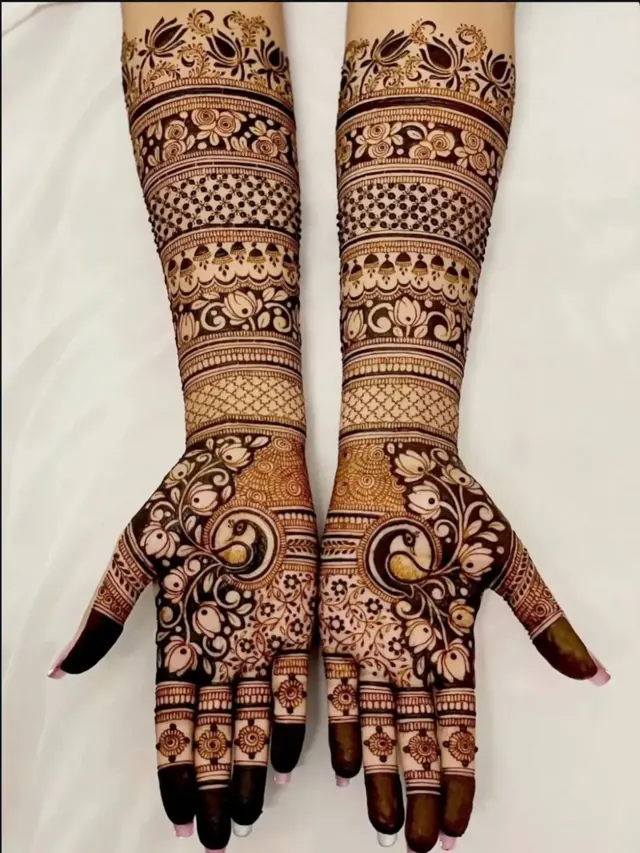 Traditional full-arm mehendi design by Anand Mehendi & Tattoo, Bhubaneswar
