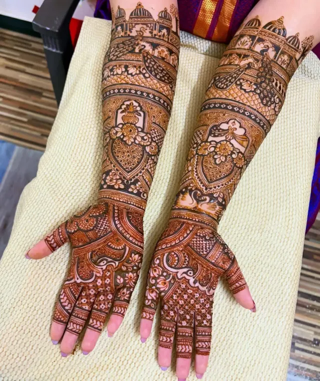Traditional full-arm mehendi design by Anand Mehendi & Tattoo, Bhubaneswar