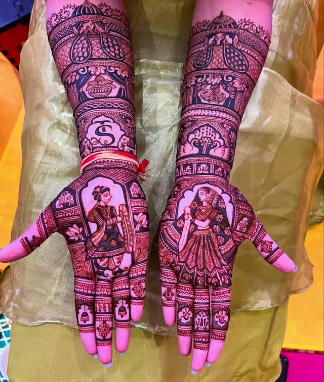 Traditional full-arm mehendi design by Anand Mehendi & Tattoo, Bhubaneswar
