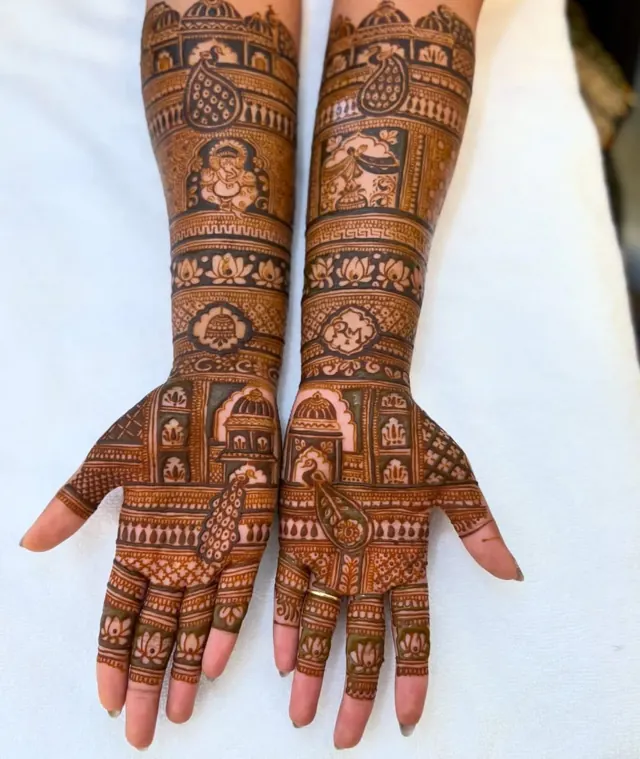 Traditional full-arm mehendi design by Anand Mehendi & Tattoo, Bhubaneswar