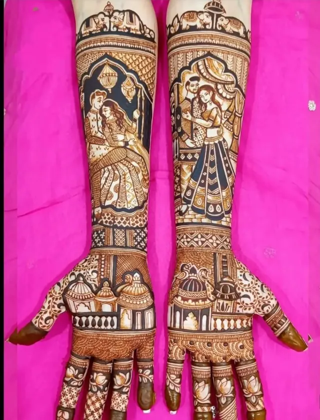 Detailed bridal mehendi design on both arms by Anand Mehendi & Tattoo, Bhubaneswar