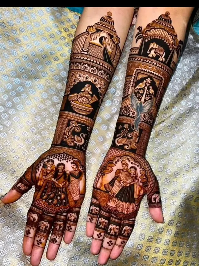 Detailed bridal mehendi design on both arms by Anand Mehendi & Tattoo, Bhubaneswar