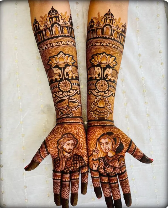 Detailed bridal mehendi design on both arms by Anand Mehendi & Tattoo, Bhubaneswar