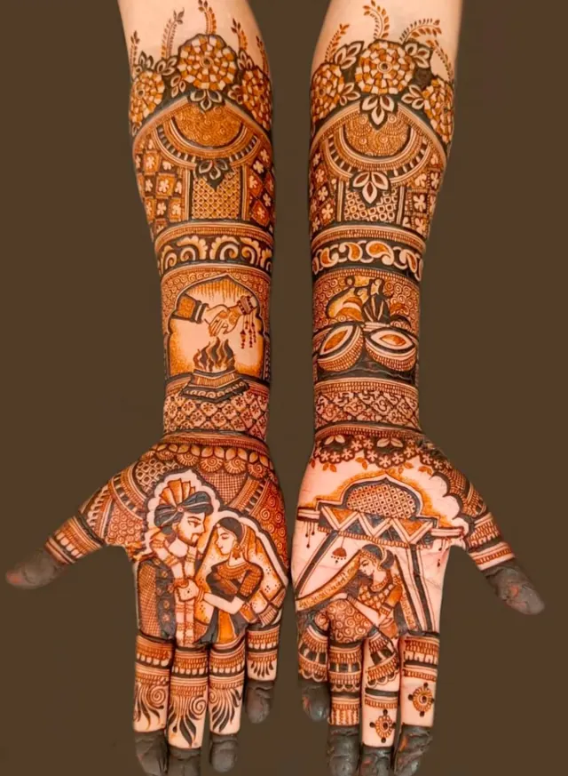 Detailed bridal mehendi design on both arms by Anand Mehendi & Tattoo, Bhubaneswar