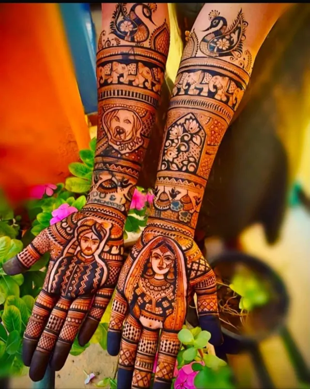 Detailed bridal mehendi design on both arms by Anand Mehendi & Tattoo, Bhubaneswar