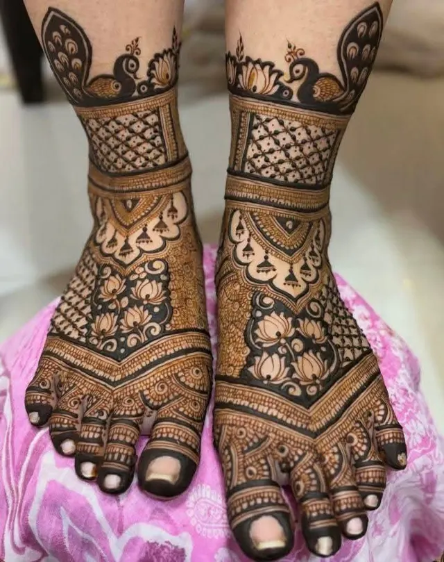 Bridal mehendi design on feet by Anand Mehendi & Tattoo, Bhubaneswar
